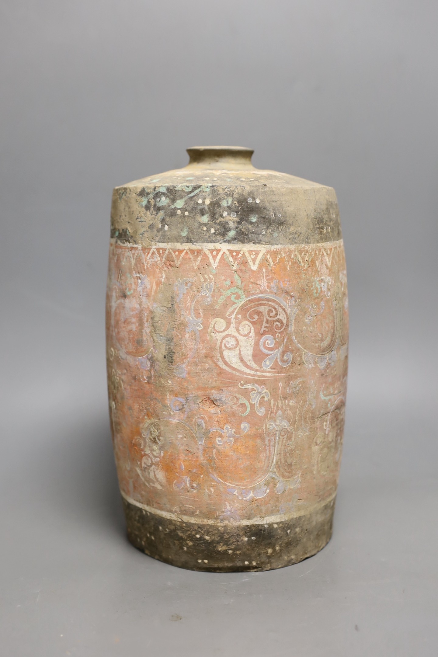 A Chinese pigment painted grey pottery jar, Han dynasty (200BCE - 220CE), 29cm high